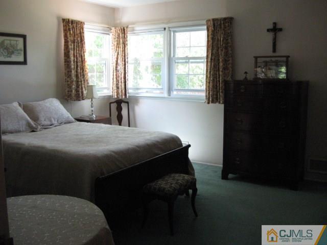 10 Glen Gary Road Middlesex, NJ 08846 - Photo 11 of 24 a bedroom with a bed and a window