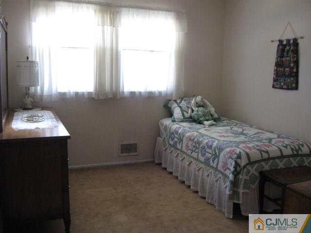 10 Glen Gary Road Middlesex, NJ 08846 - Photo 14 of 24 a bedroom with a bed and a window