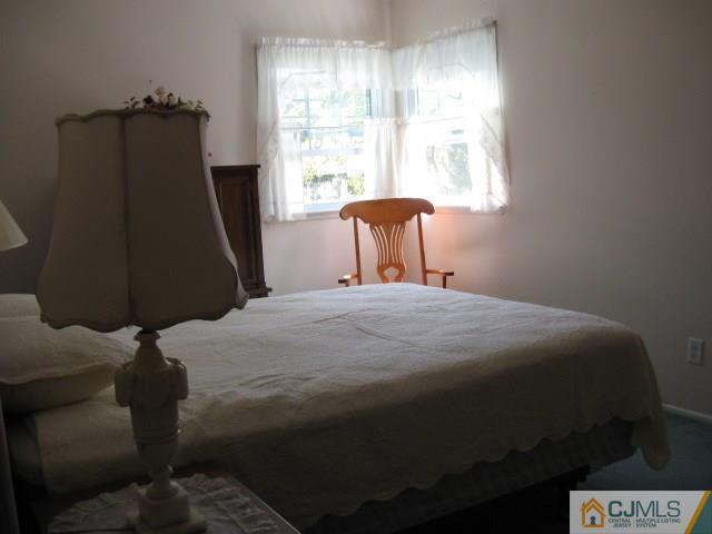 10 Glen Gary Road Middlesex, NJ 08846 - Photo 15 of 24 a bedroom with a bed and window