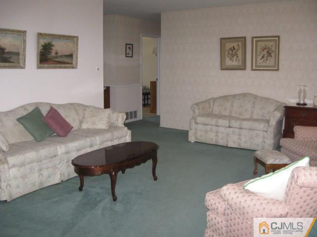 10 Glen Gary Road Middlesex, NJ 08846 - Photo 4 of 24 a living room with furniture and a couch