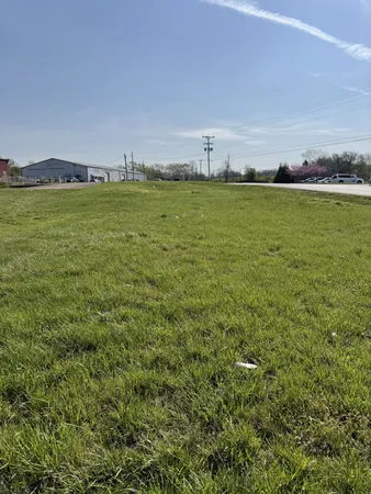 a view of a ocean with a large building in the back