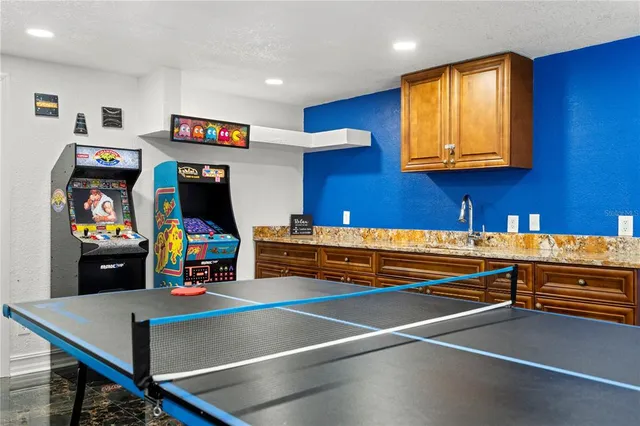 a room with furniture and a flat screen tv