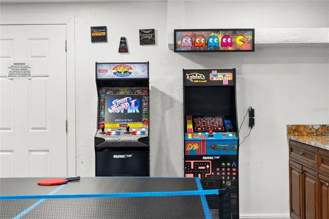 a living room with dryer and a flat screen tv