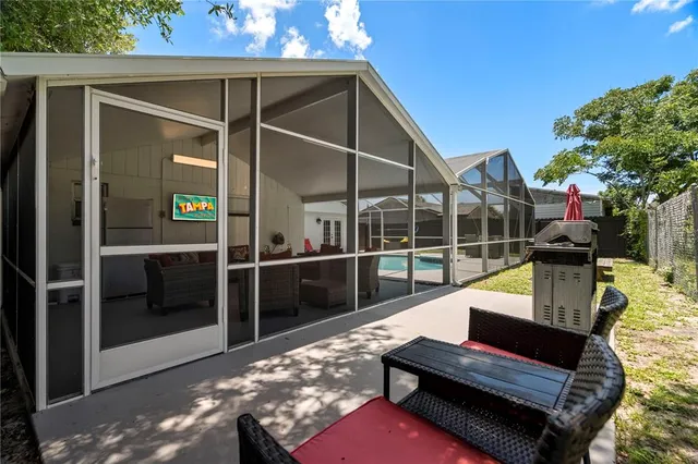 a view of a chairs and tables in the balcony