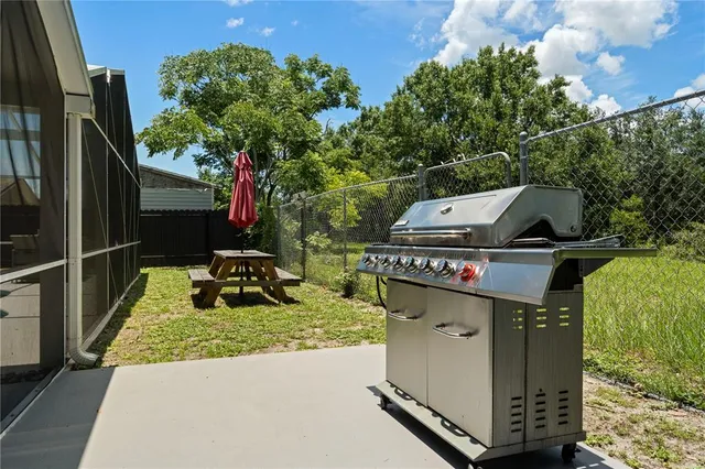 an aerial view of a house with swimming pool