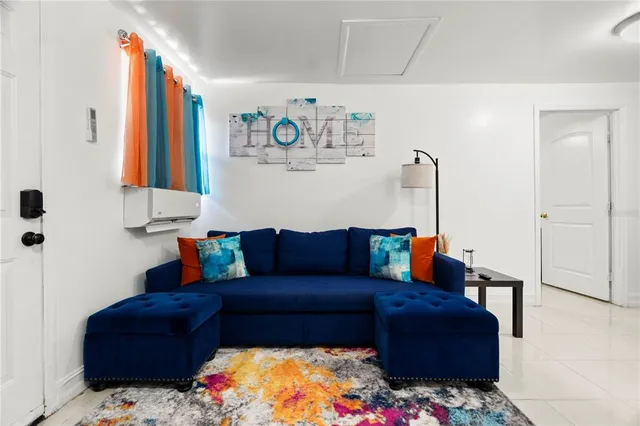 a living room with furniture and a couch