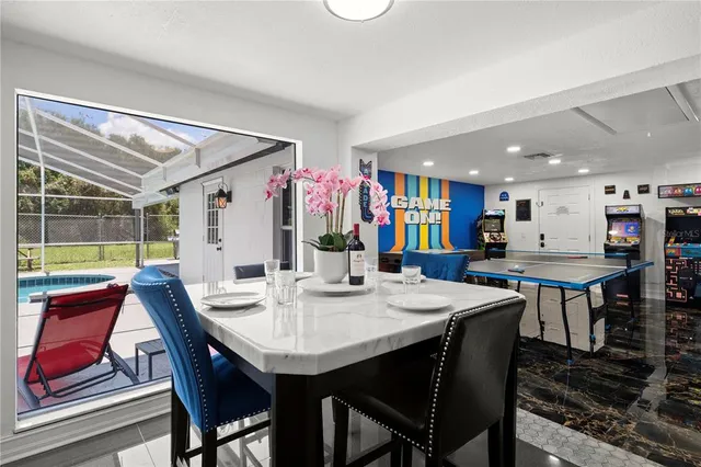 a view of a dining room with furniture