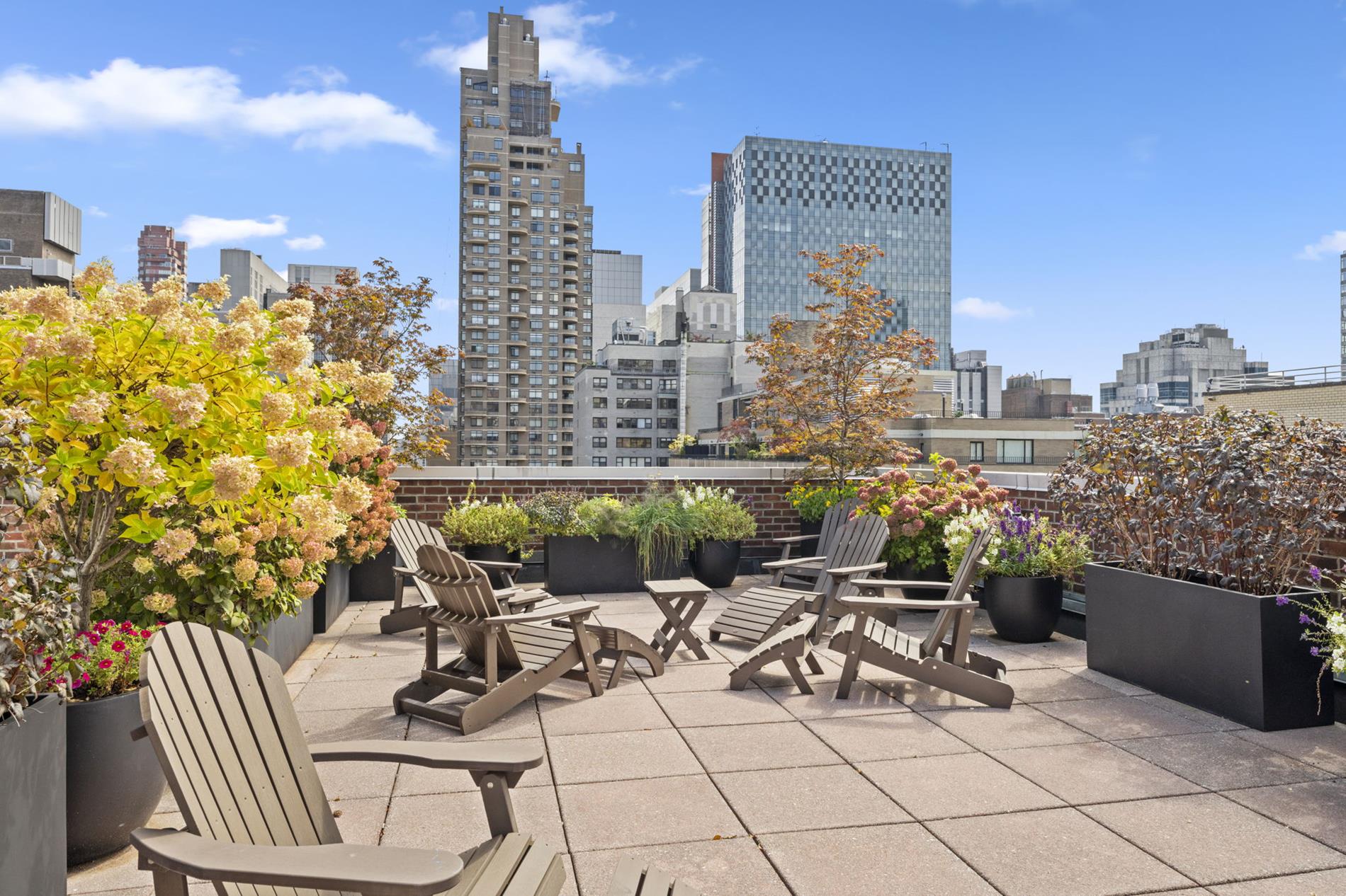 310 East 70th Street, Unit 1G Manhattan, NY 10021 - Photo 6 of 7 a view of a terrace with sitting area