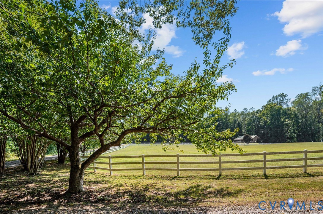 1801 Georgetown Road Heathsville, VA 22473 - Photo 12 of 83 Expansive fenced pasture with lush green grass and
