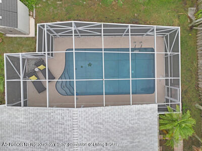 538 Riverside Drive Palm Beach Gardens, FL 33410 - Photo 34 of 52 a backyard of a house