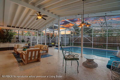 538 Riverside Drive Palm Beach Gardens, FL 33410 - Photo 45 of 52 a view of a chairs and tables in patio