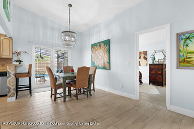 538 Riverside Drive Palm Beach Gardens, FL 33410 - Photo 7 of 52 a view of a dining room with furniture