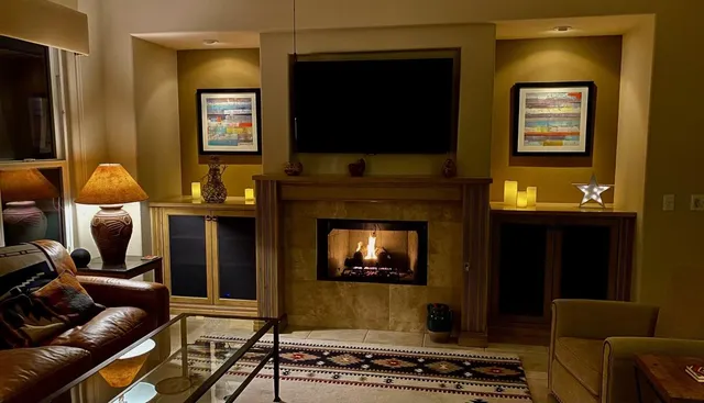 a living room with furniture and a flat screen tv