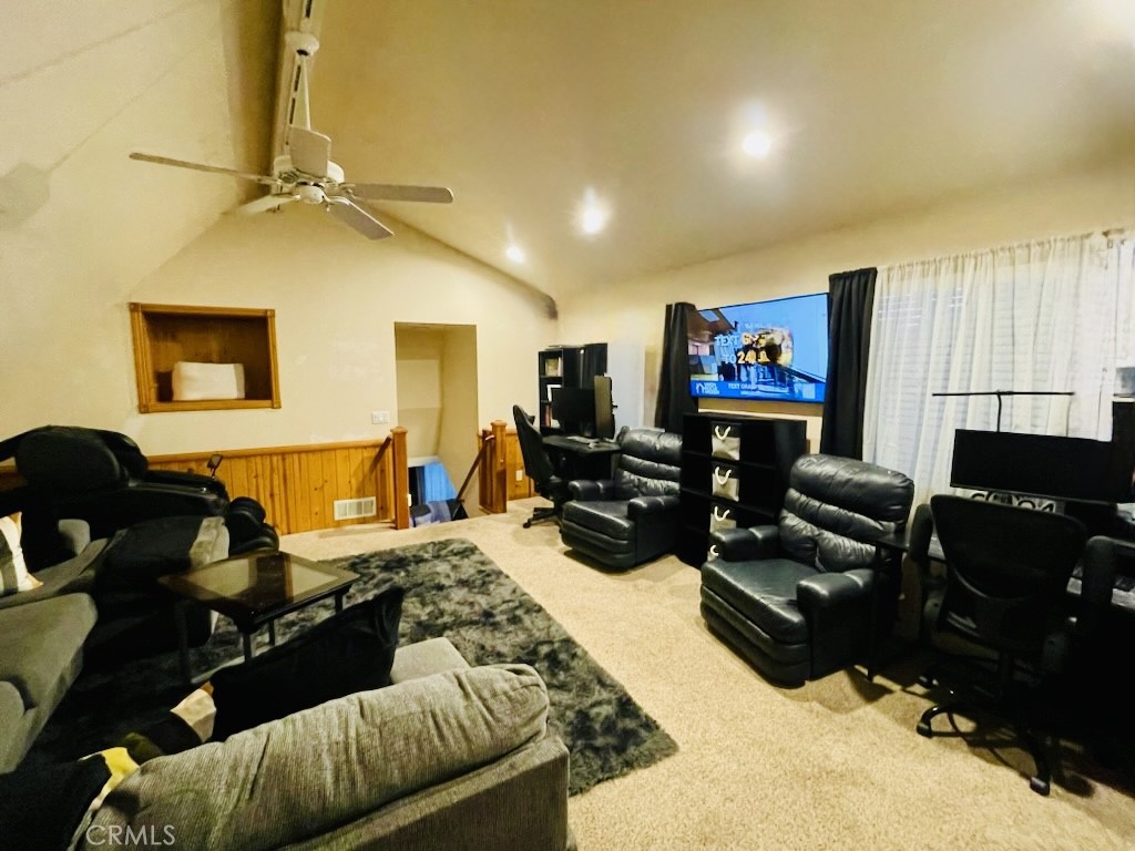 26620 Modoc Lane Lake Arrowhead, CA 92352 - Photo 13 of 14 a living room with furniture and a flat screen tv