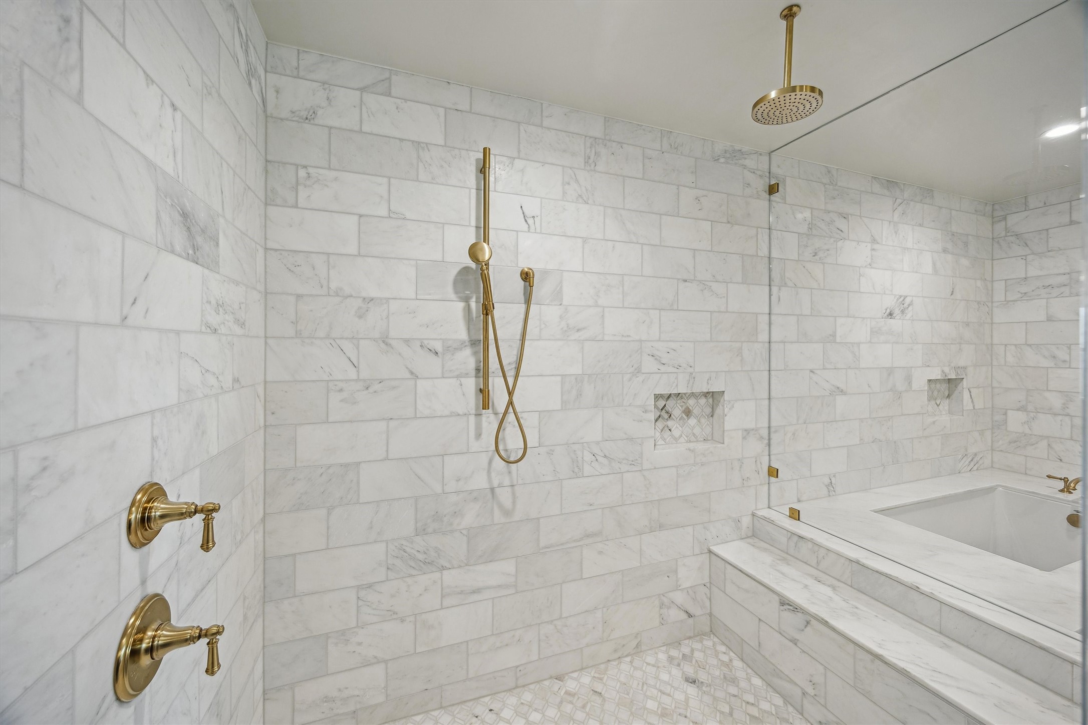 1717 Bissonnet Street, Unit 1802 Houston, TX 77005 - Photo 21 of 46 Oversized marble shower with rain shower, handheld and bench.