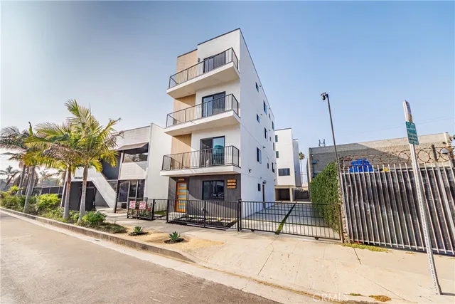 a view of house with outdoor space and swimming pool