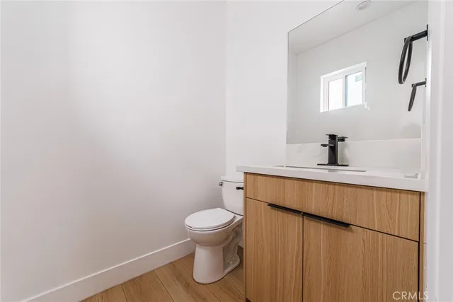 a bathroom with a toilet and a sink