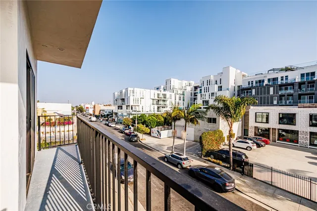 a view of a balcony with city view