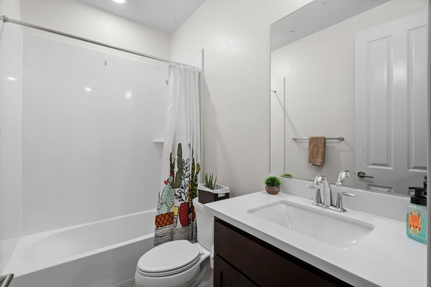 718 Amalfi Loop Milpitas, CA 95035 - Photo 17 of 37 a bathroom with a sink toilet and shower