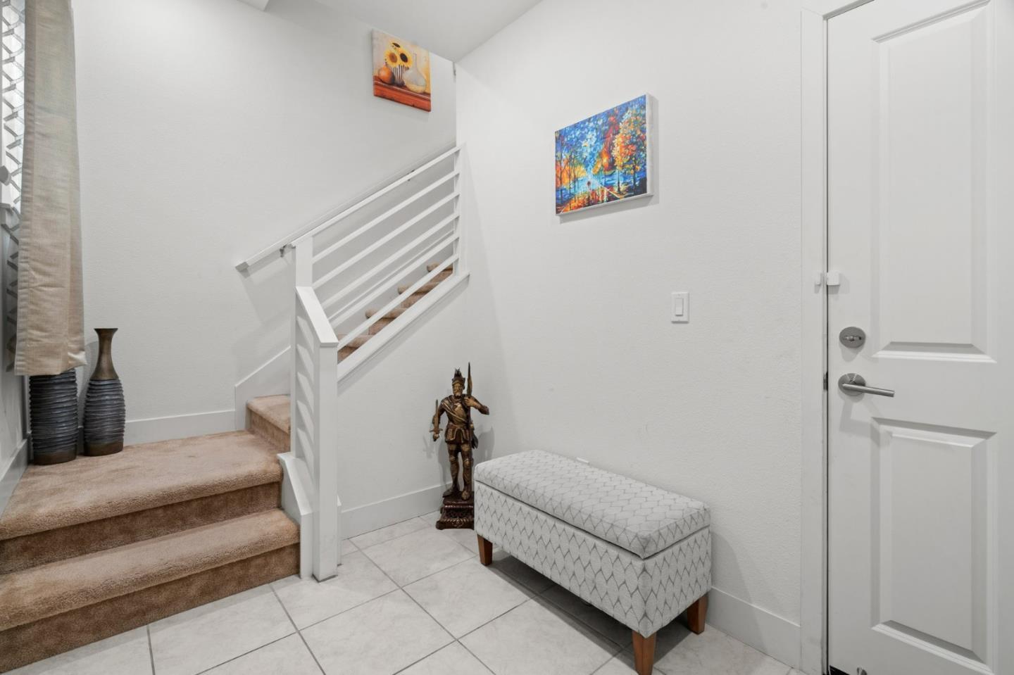 718 Amalfi Loop Milpitas, CA 95035 - Photo 3 of 37 a living room with furniture and a couch