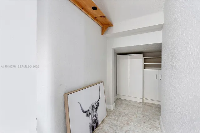 a view of a storage & utility room with washer and dryer