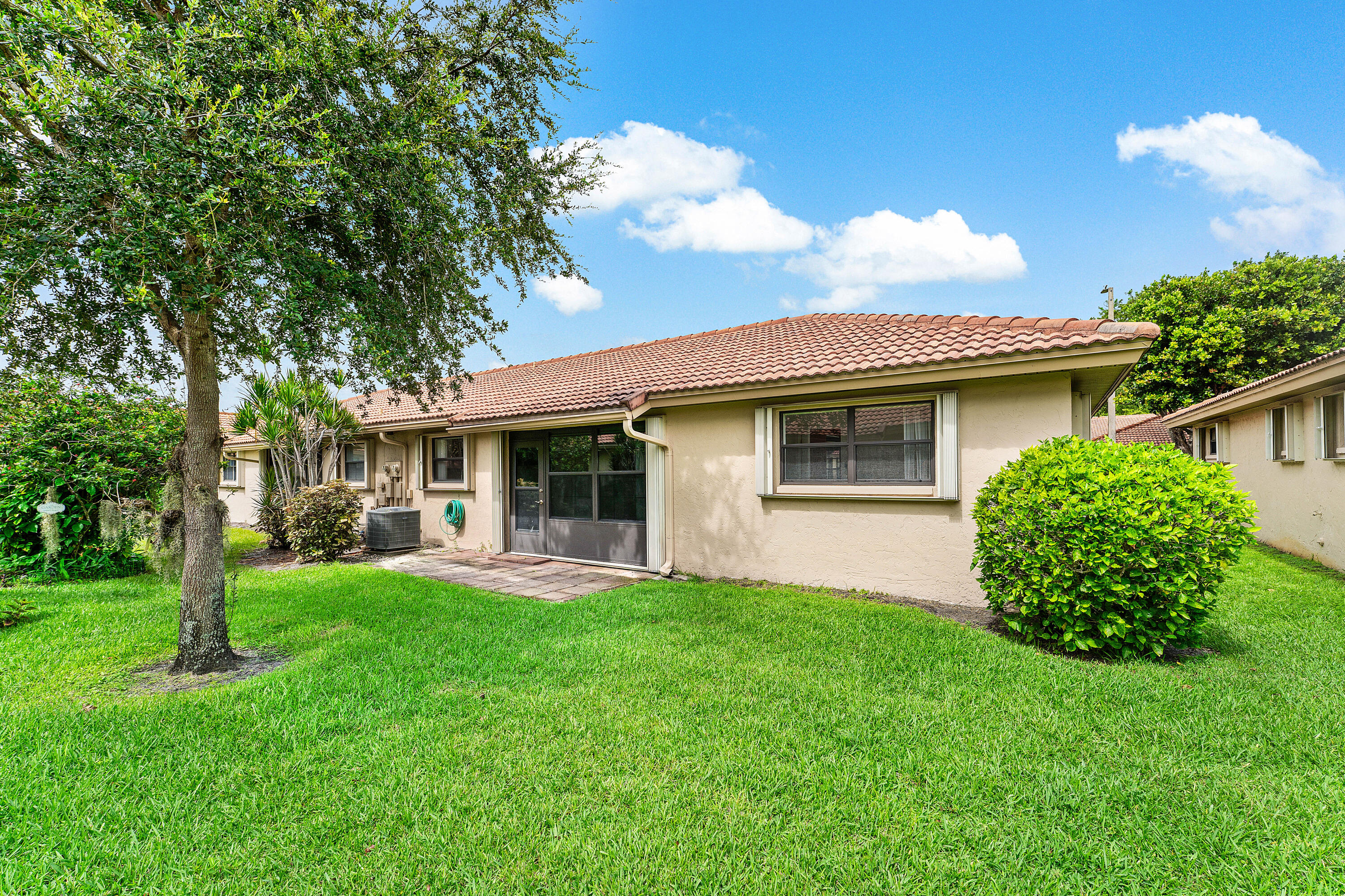 4670 Laurel Tree Road, Unit A Boynton Beach, FL 33436 - Photo 24 of 28 BACK OF VILLA