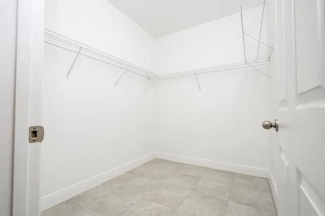 a bathroom with a toilet and a bathtub