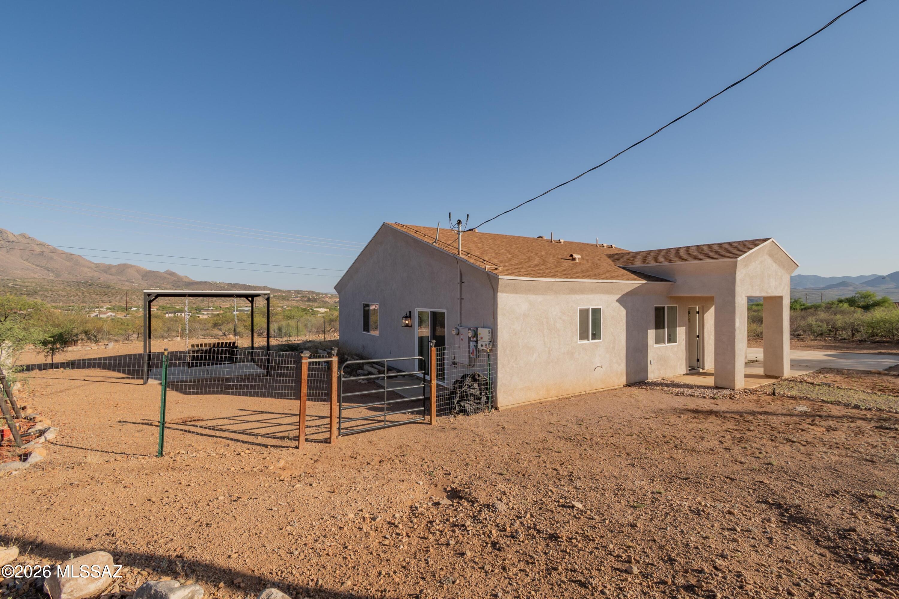 1785 Dove Court Rio Rico, AZ 85648 - Photo 4 of 31 a house with a outdoor space