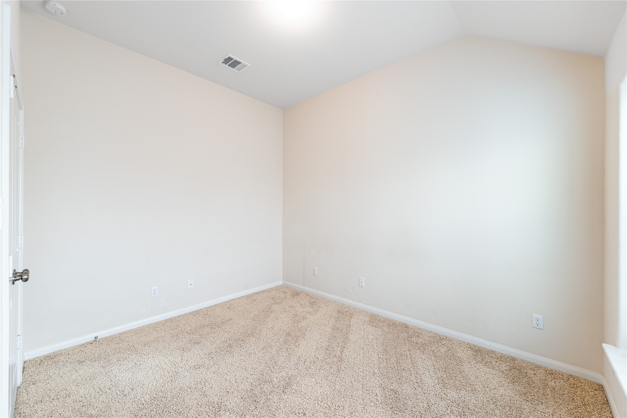 5012 Yucca Bloom Drive Georgetown, TX 78626 - Photo 19 of 35 Neutral tone-on-tone carpeted room with white trim
