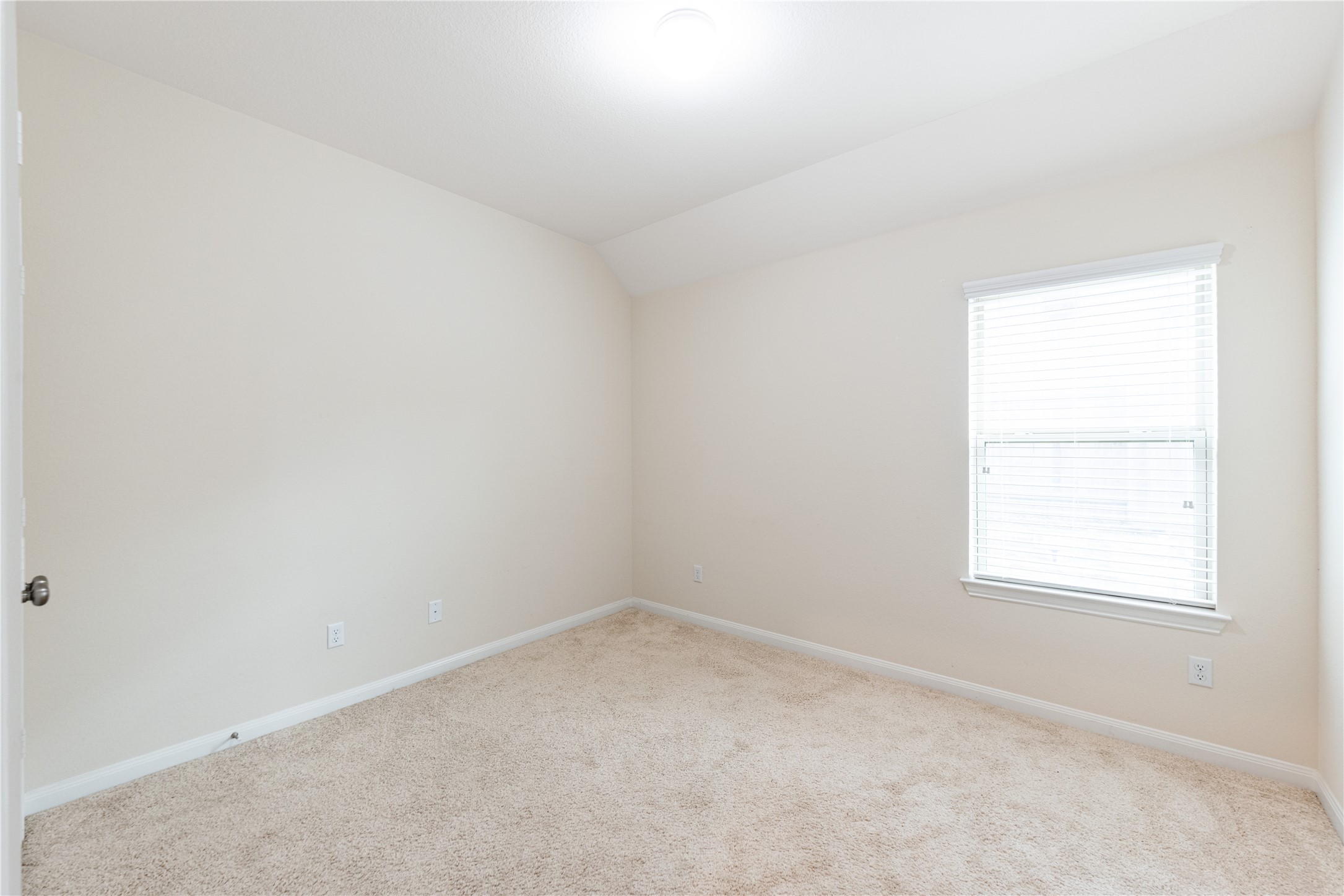 5012 Yucca Bloom Drive Georgetown, TX 78626 - Photo 21 of 35 Neutral wall tones with a single window featuring horizontal blinds