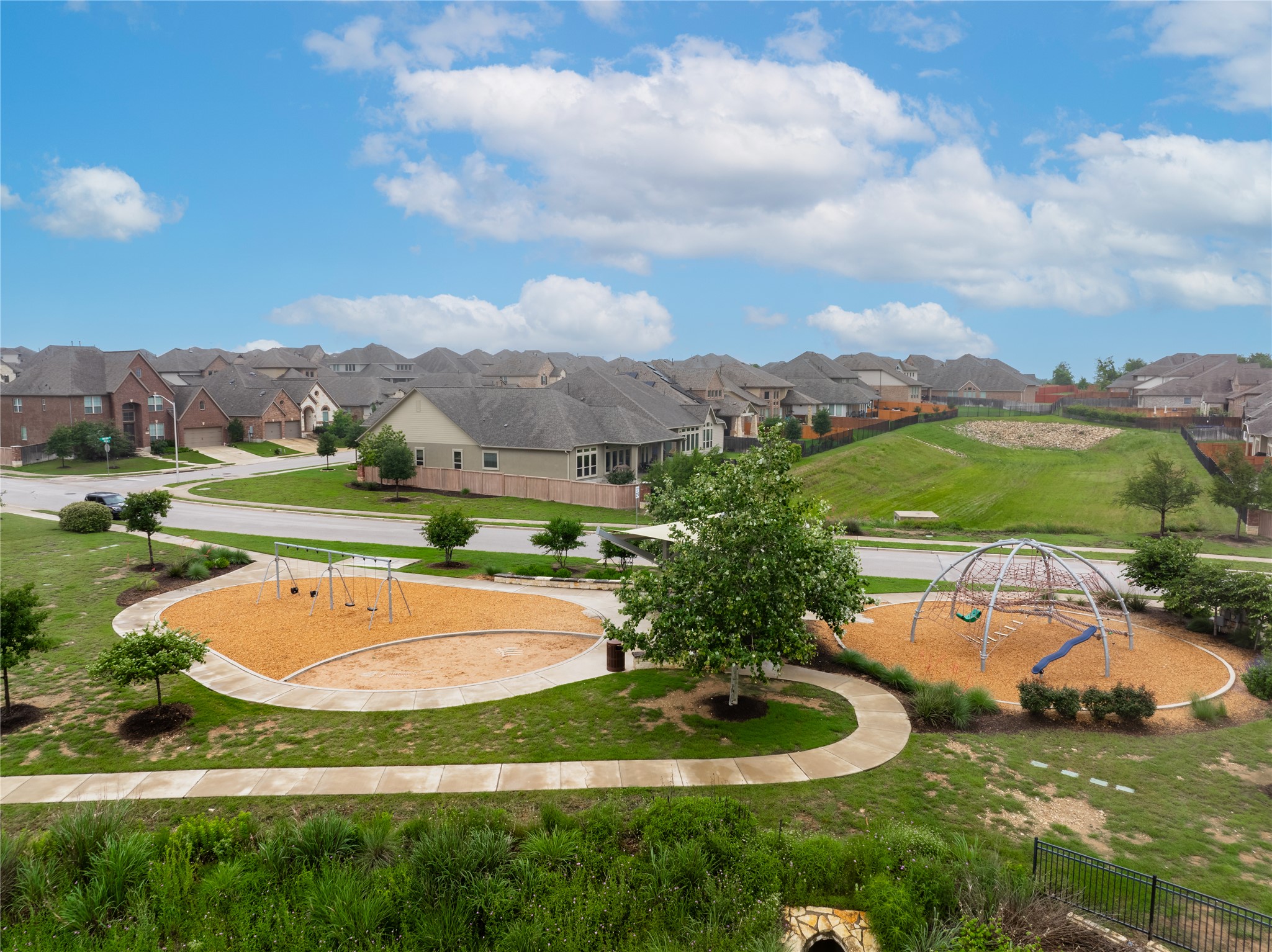 5012 Yucca Bloom Drive Georgetown, TX 78626 - Photo 35 of 35 Community park featuring two distinct play areas with safety surfacing and mature trees