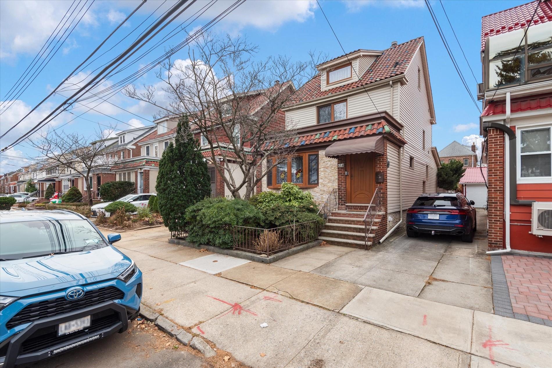 63-16 84th Place Queens, NY 11379 - Photo 1 of 12 a view of a car garage