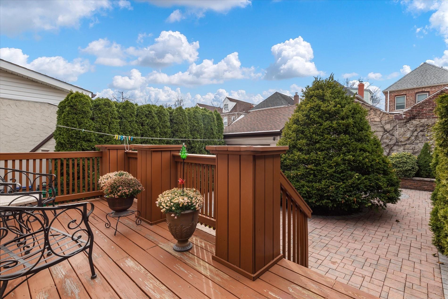 63-16 84th Place Queens, NY 11379 - Photo 6 of 12 a view of a balcony with chairs