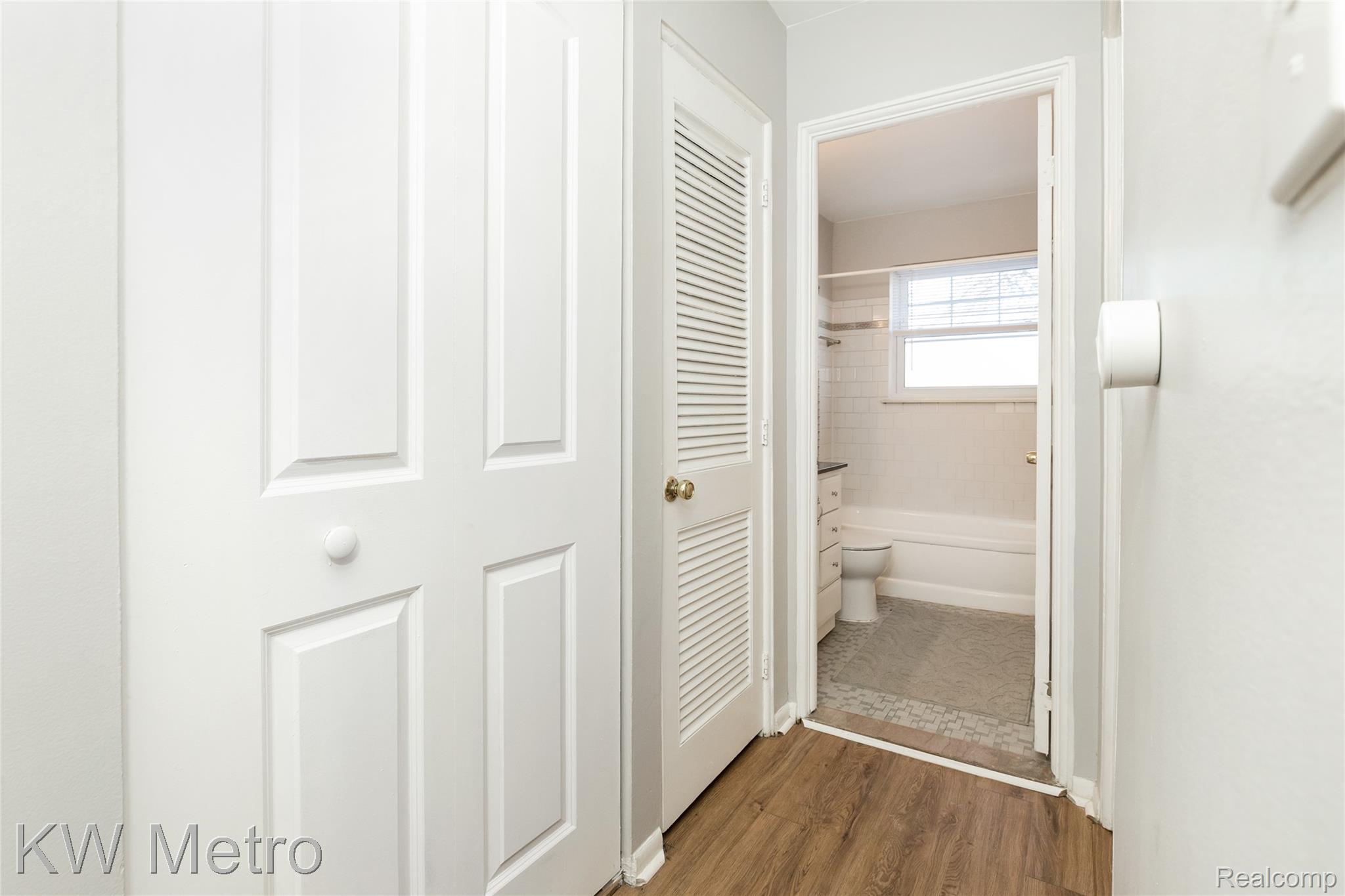 2817 West 13 Mile Road Royal Oak, MI 48073 - Photo 16 of 21 Hall with dark wood-style flooring