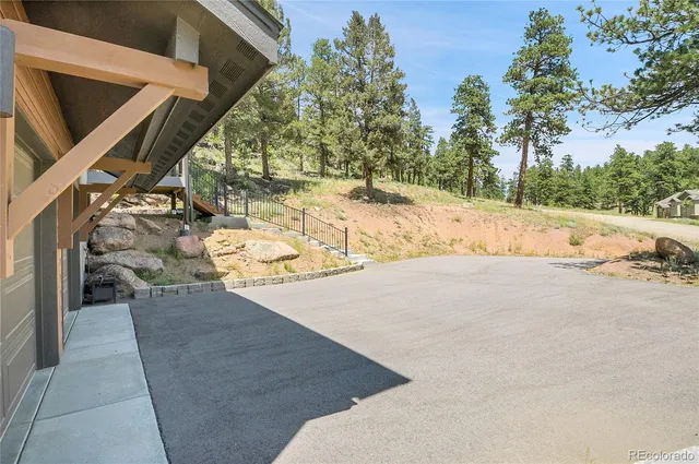 a view of kitchen with furniture and a stove