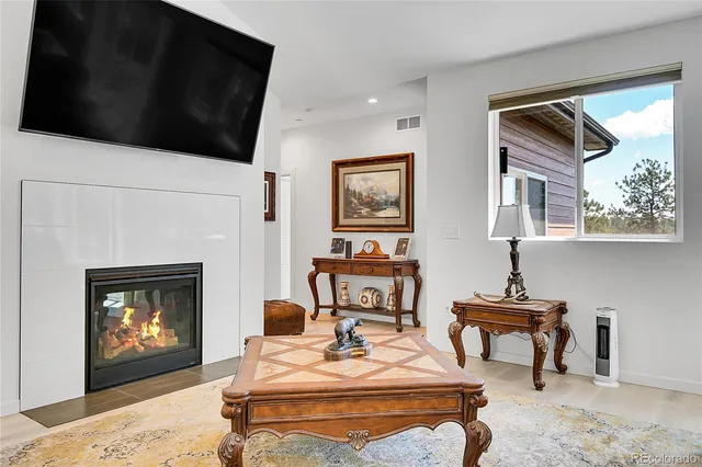 a view of workspace with painting on the wall