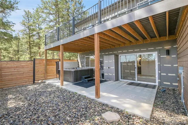 a view of a house with a yard and garage