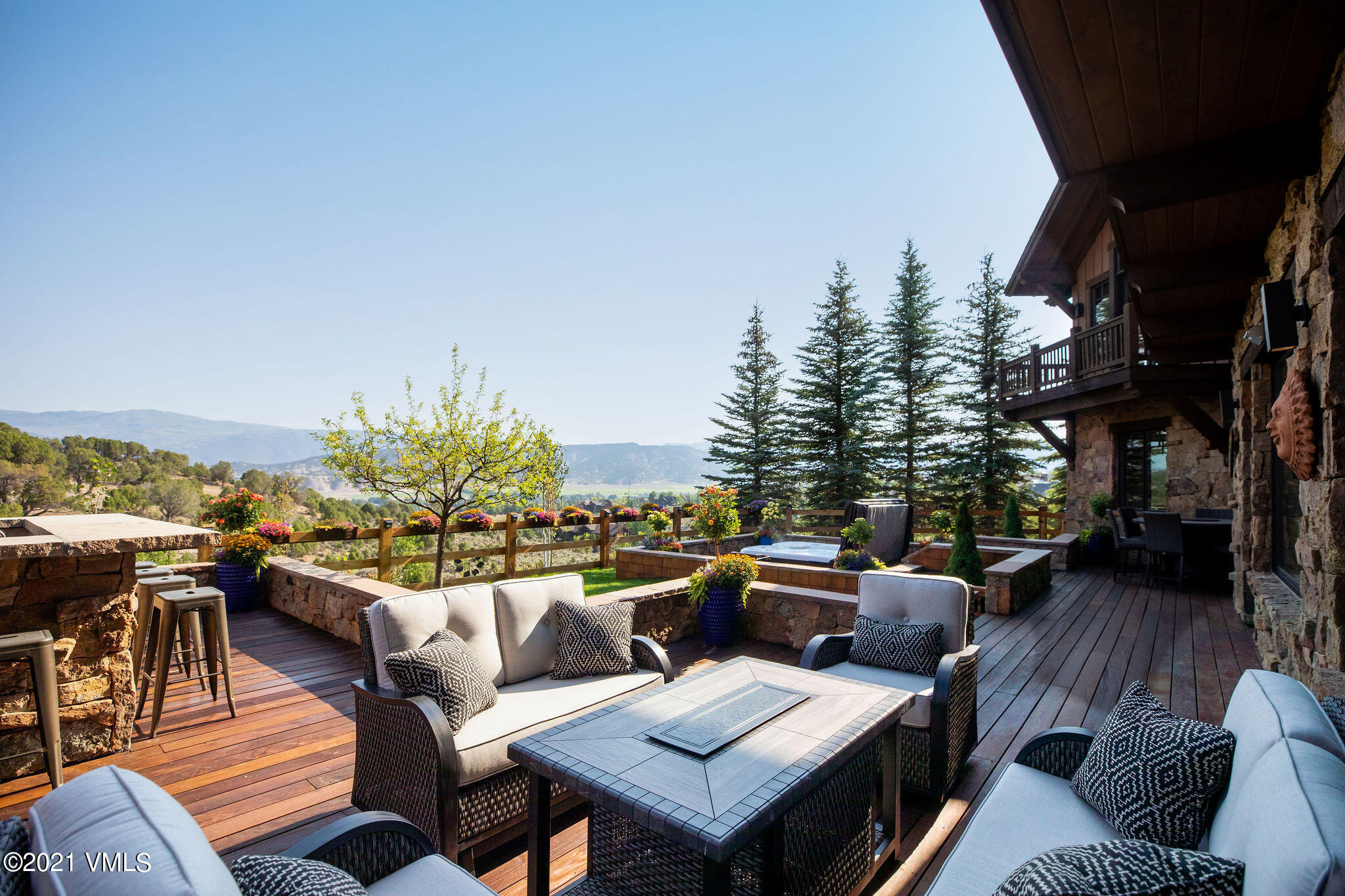 1168 Hernage Creek Road Eagle, CO 81631 - Photo 11 of 22 an outdoor living room with patio furniture and a potted plant