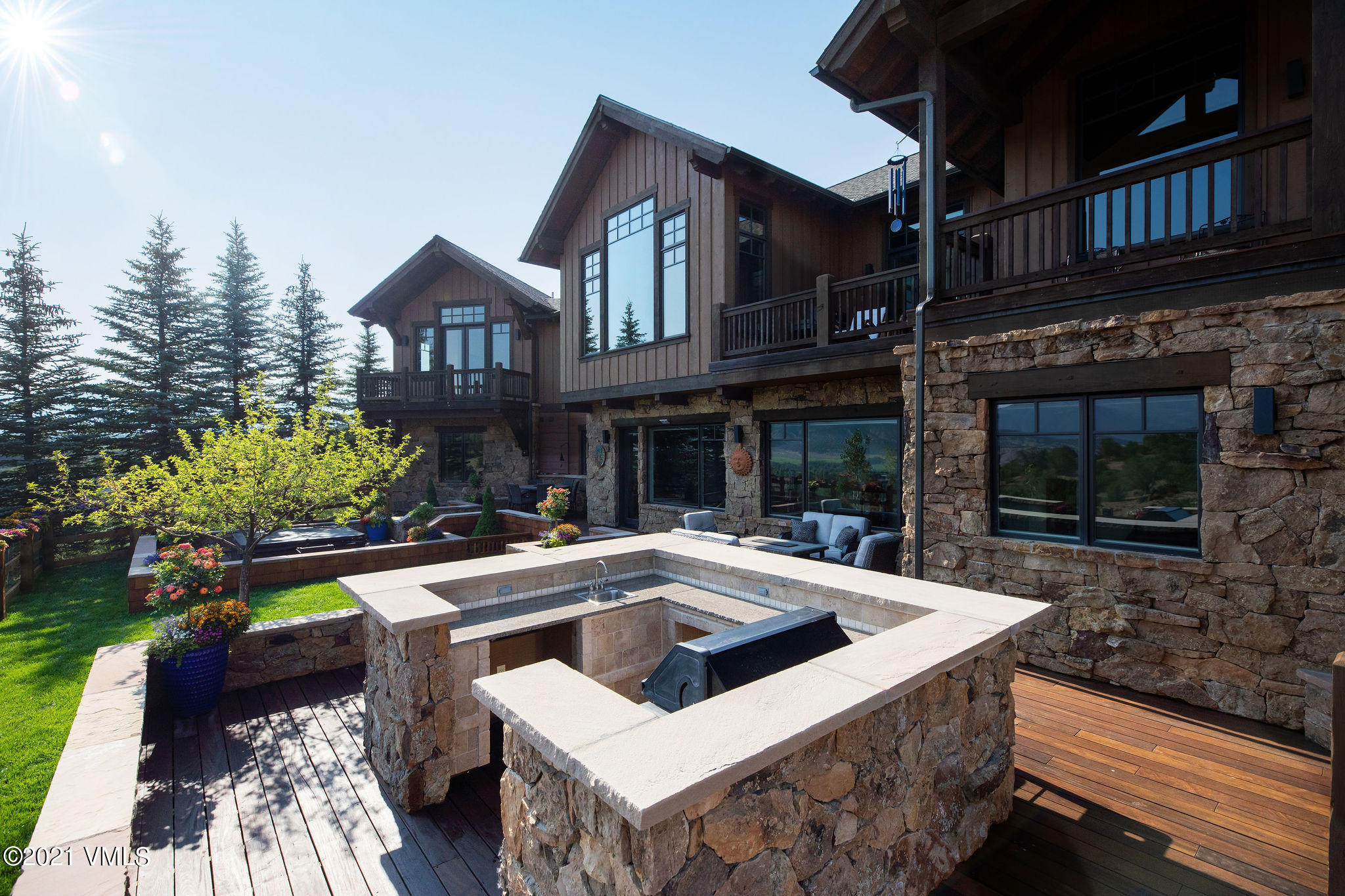 1168 Hernage Creek Road Eagle, CO 81631 - Photo 13 of 22 a front view of a house with a yard table and chairs