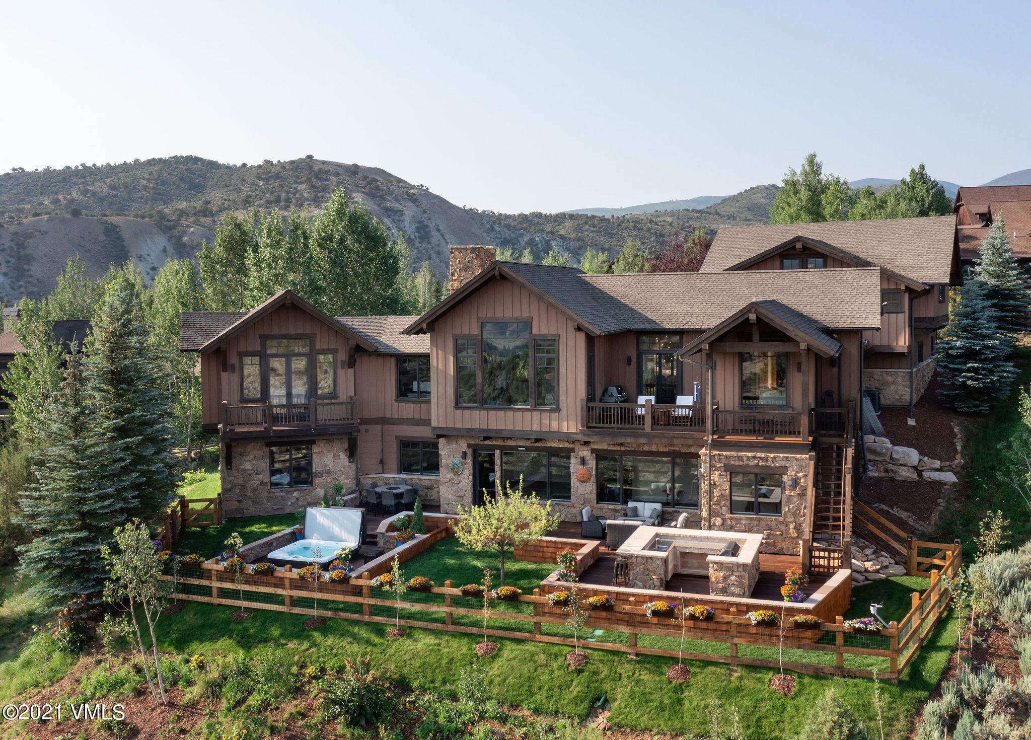 1168 Hernage Creek Road Eagle, CO 81631 - Photo 16 of 22 a aerial view of a house with swimming pool and a yard