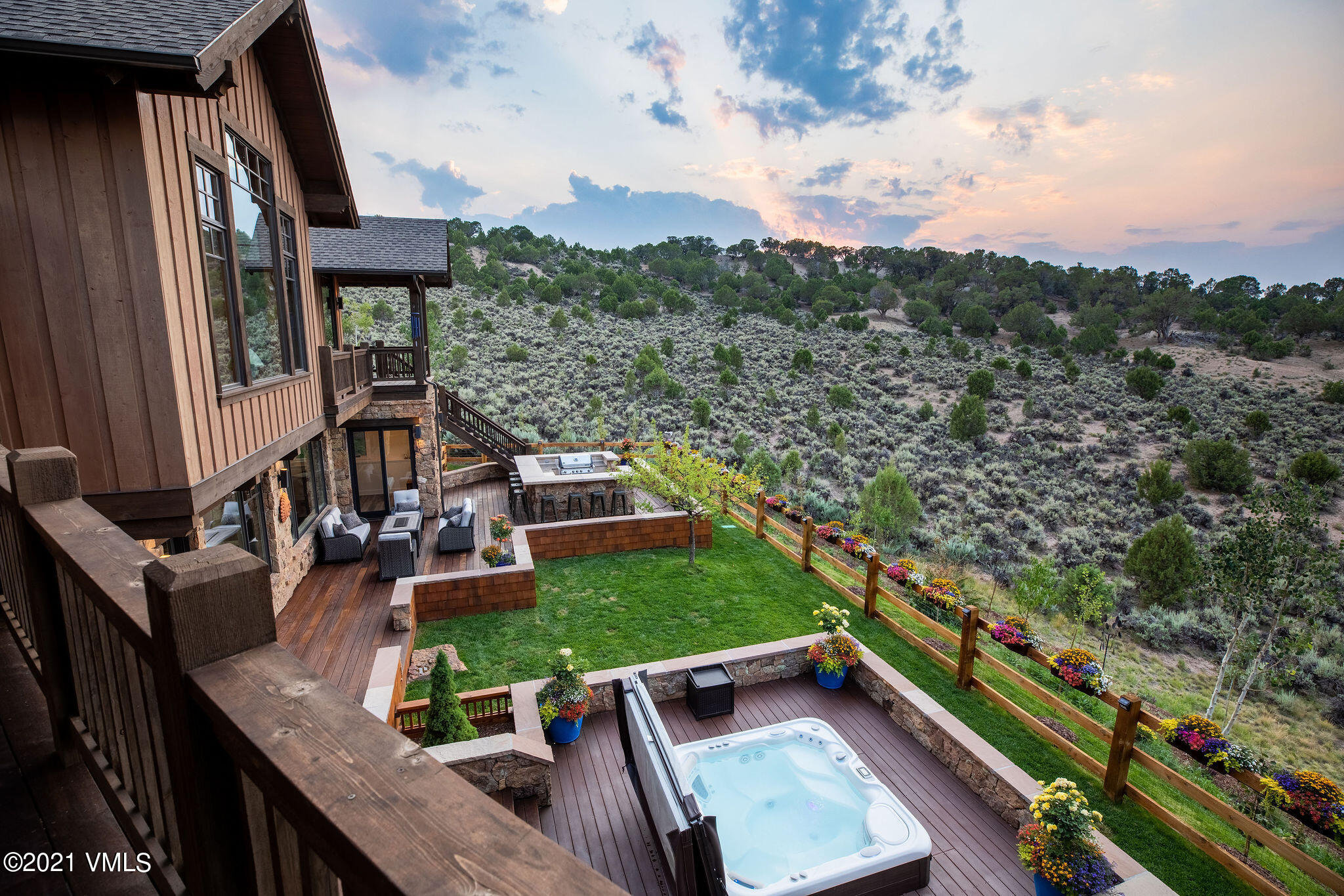 1168 Hernage Creek Road Eagle, CO 81631 - Photo 18 of 22 an aerial view of a house with a garden and lake view