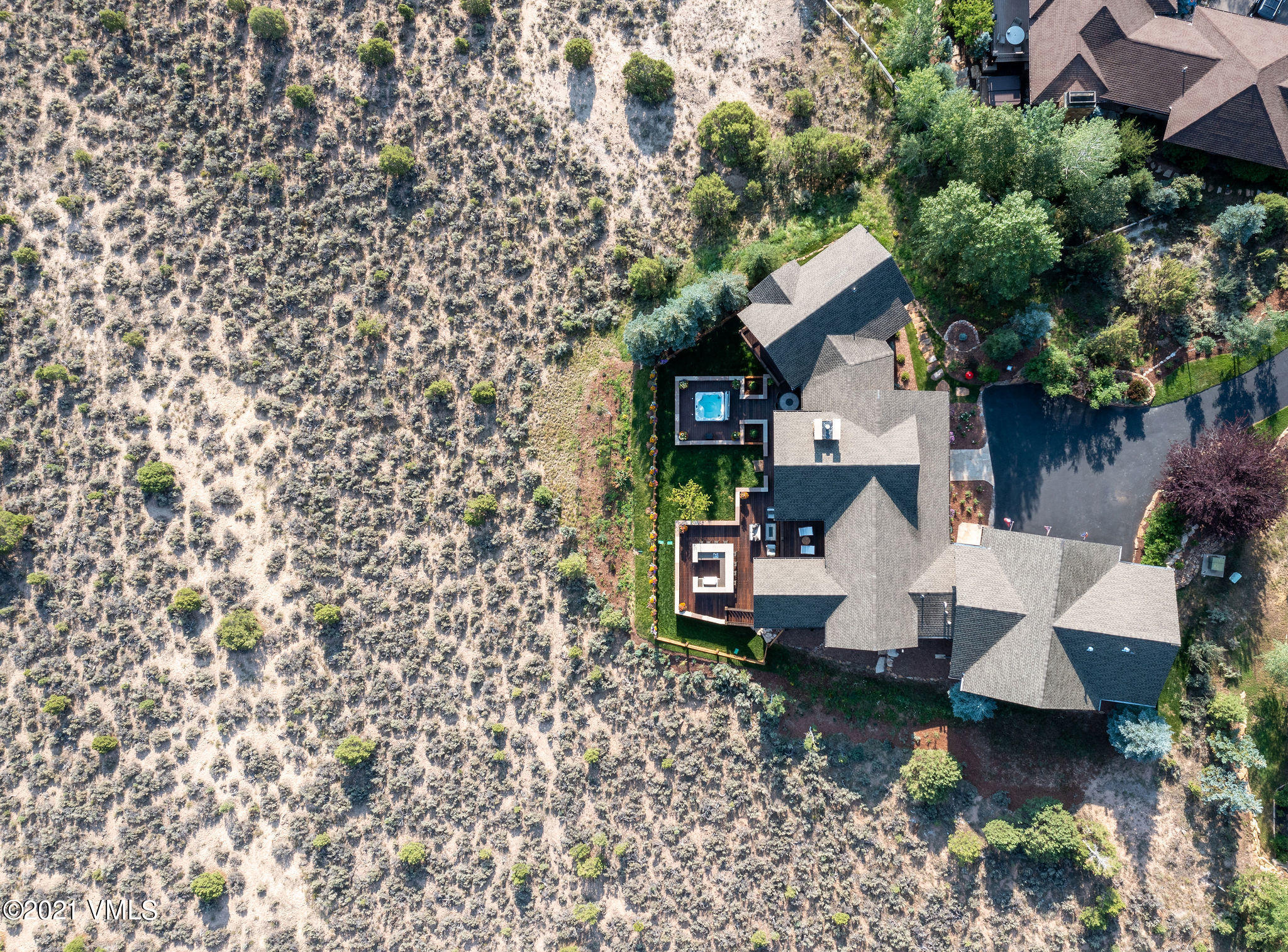 1168 Hernage Creek Road Eagle, CO 81631 - Photo 21 of 22 a front view of a house with garden