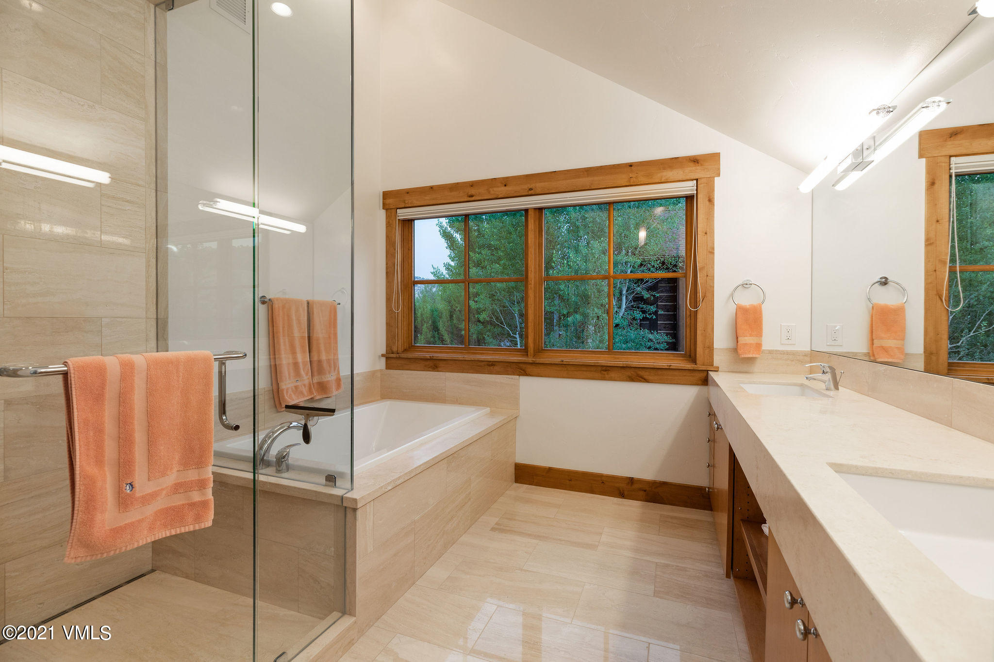 1168 Hernage Creek Road Eagle, CO 81631 - Photo 9 of 22 a bathroom with a tub sink and mirror