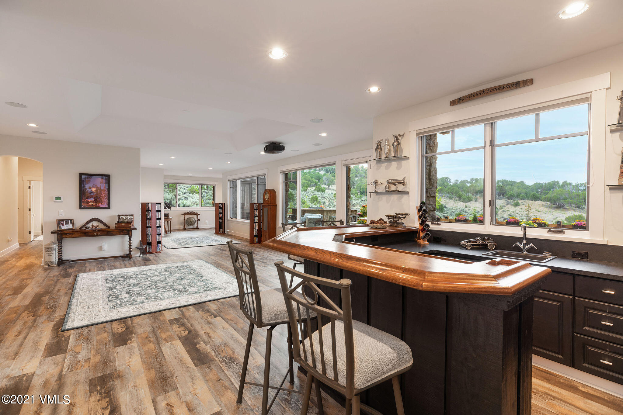 1168 Hernage Creek Road Eagle, CO 81631 - Photo 10 of 22 a dining hall with stainless steel appliances granite countertop a table chairs and a sink