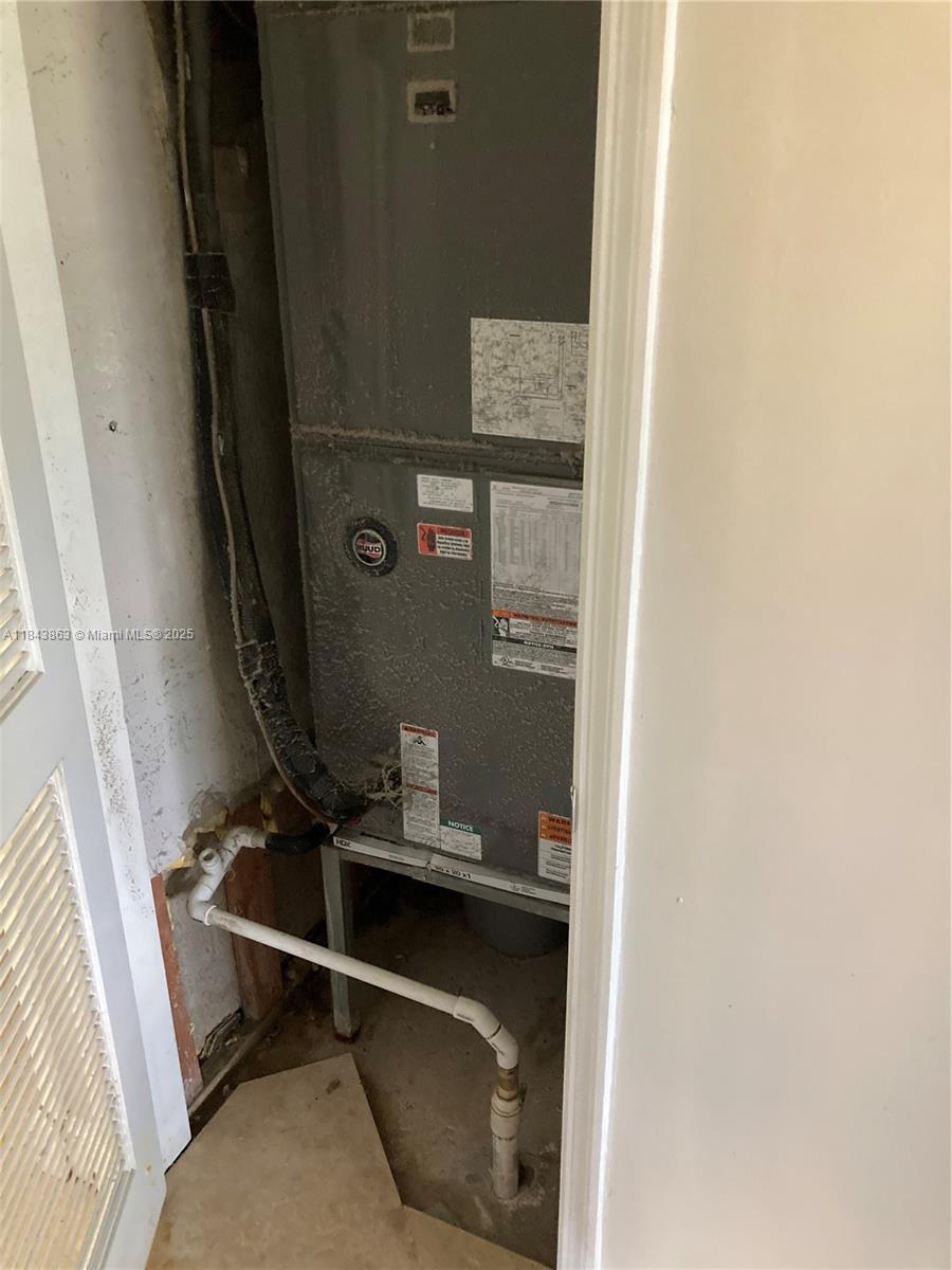 10801 Southwest 123rd Street Miami, FL 33176 - Photo 19 of 25 a bathroom with a sink and a mirror