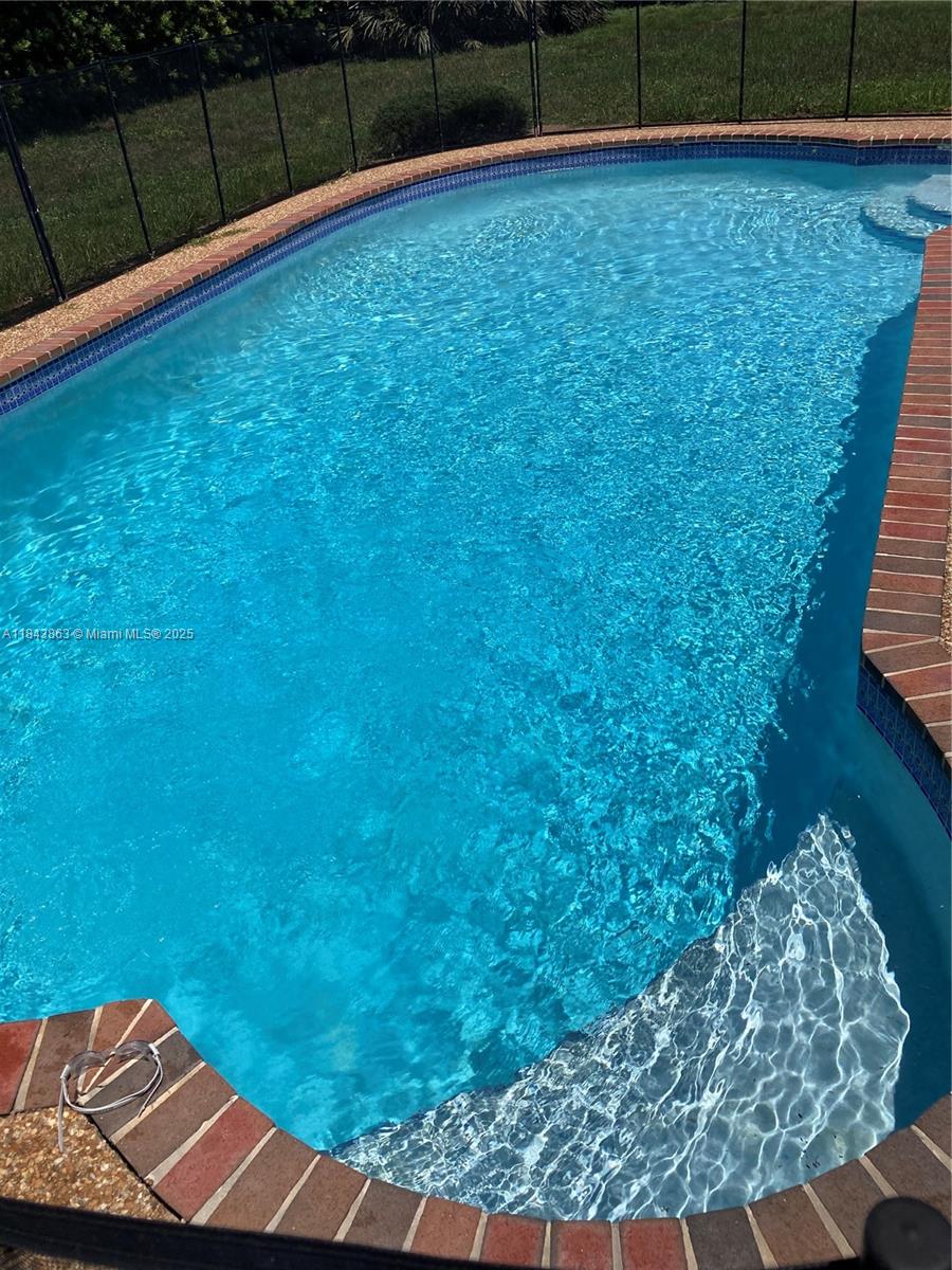 10801 Southwest 123rd Street Miami, FL 33176 - Photo 20 of 25 a view of a backyard