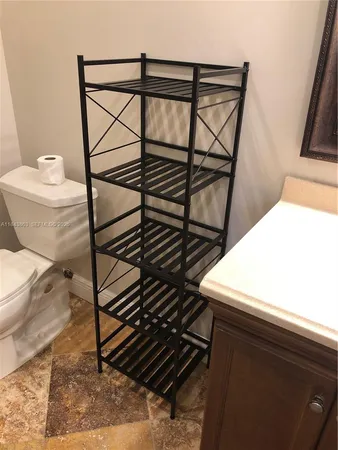 a bathroom with a toilet