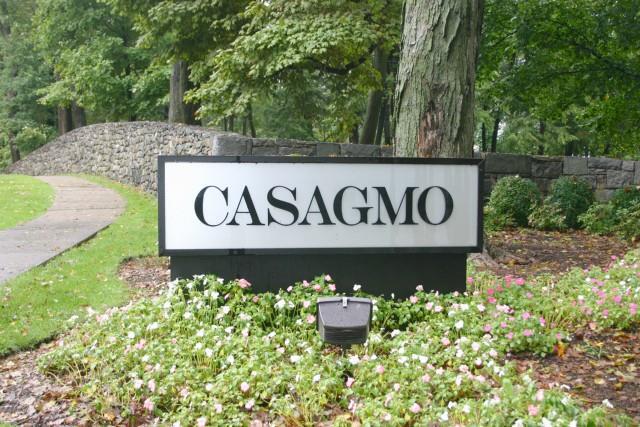 84 Lawson Lane, Unit 84 Ridgefield, CT 06877 - Photo 1 of 1 a sign that is sitting in front of flowers