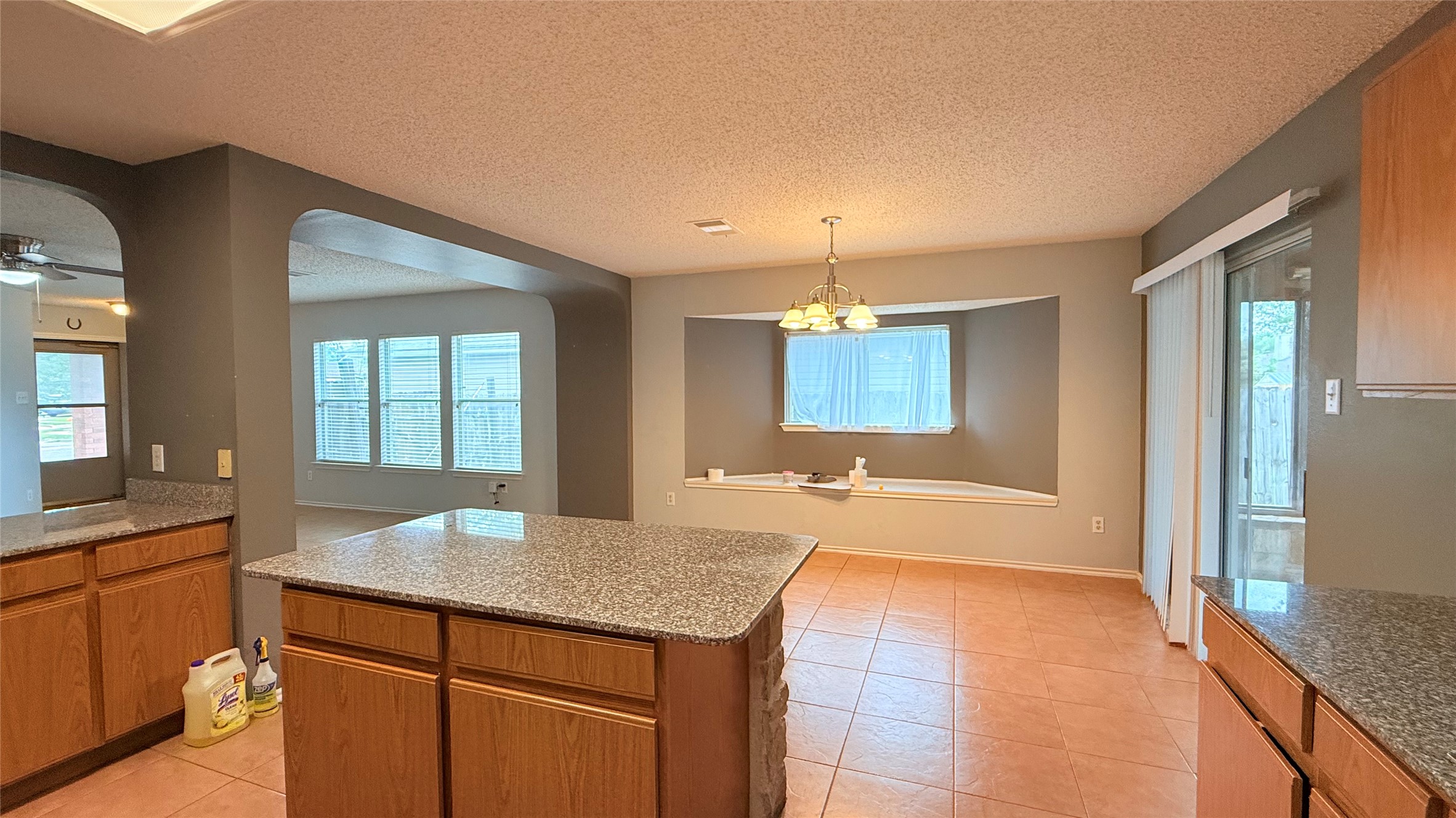 3324 Perch Trail Round Rock, TX 78665 - Photo 11 of 29 a spacious bathroom with a granite countertop sink a mirror and a bathtub