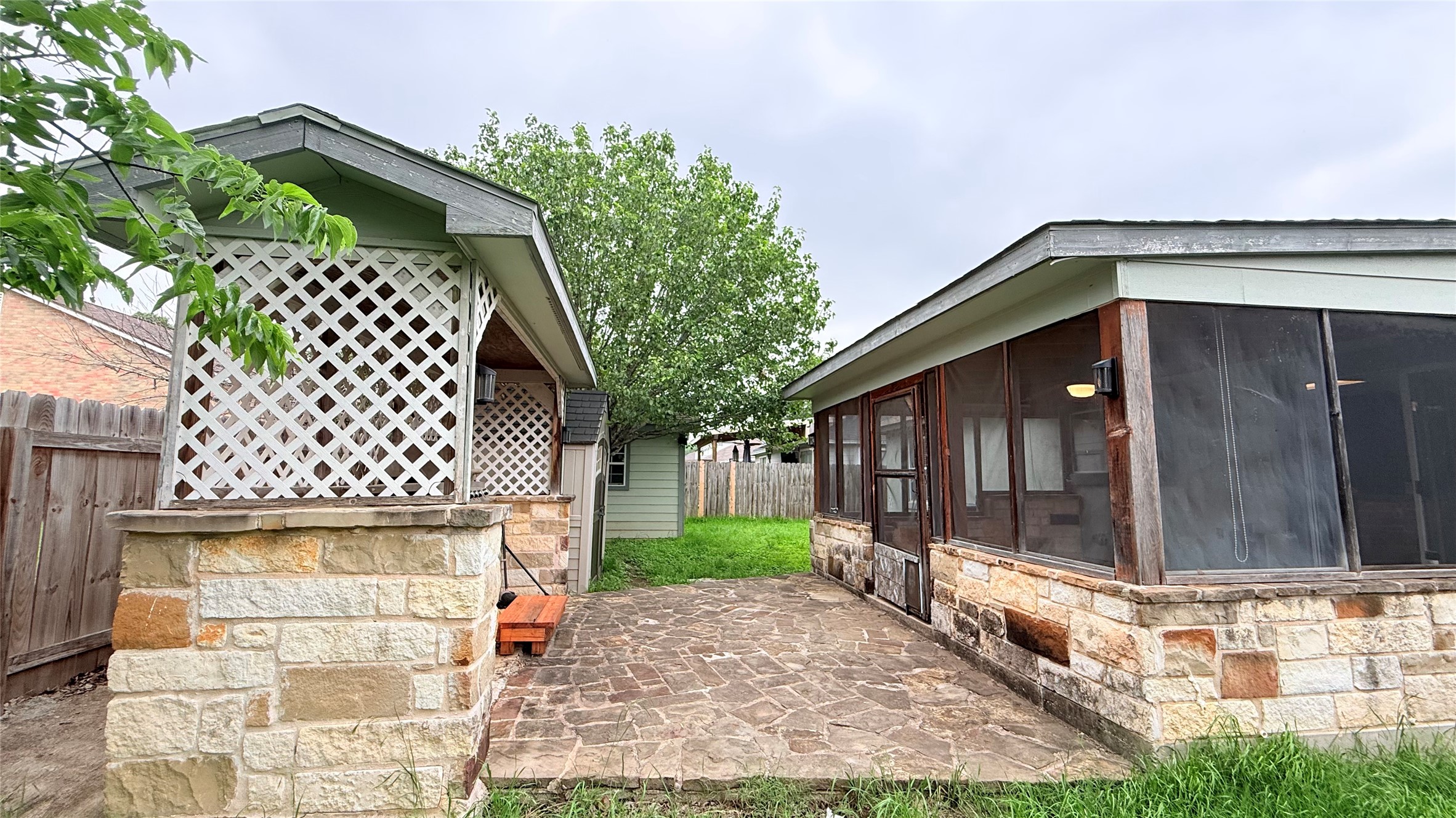 3324 Perch Trail Round Rock, TX 78665 - Photo 16 of 29 a view of a house with a large window and wooden fence